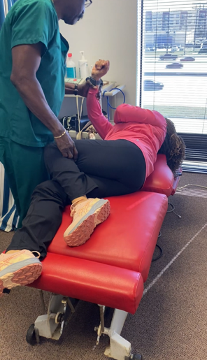 Sports injury chiropractor in Houston providing back treatment