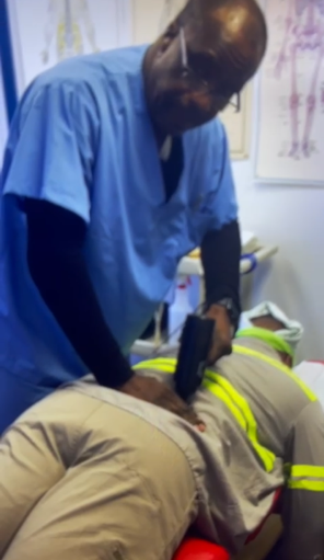 Houston back pain chiropractor performing spinal care